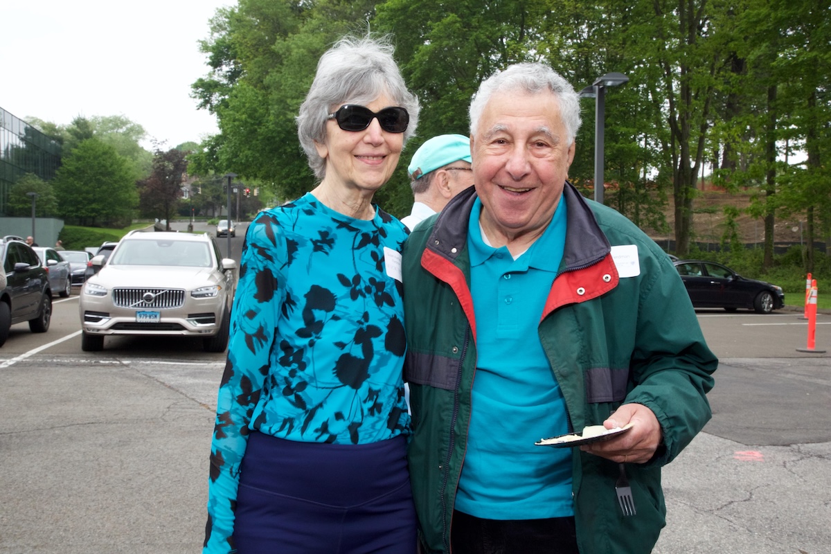 seniors smiling at a senior living breaking ground event in stamford, ct